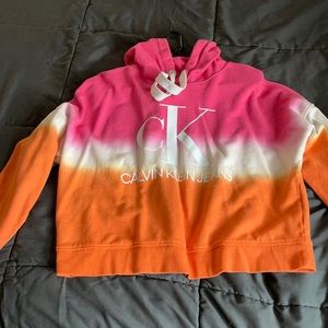 Tie dye Calvin Klein cropped hoodie.
